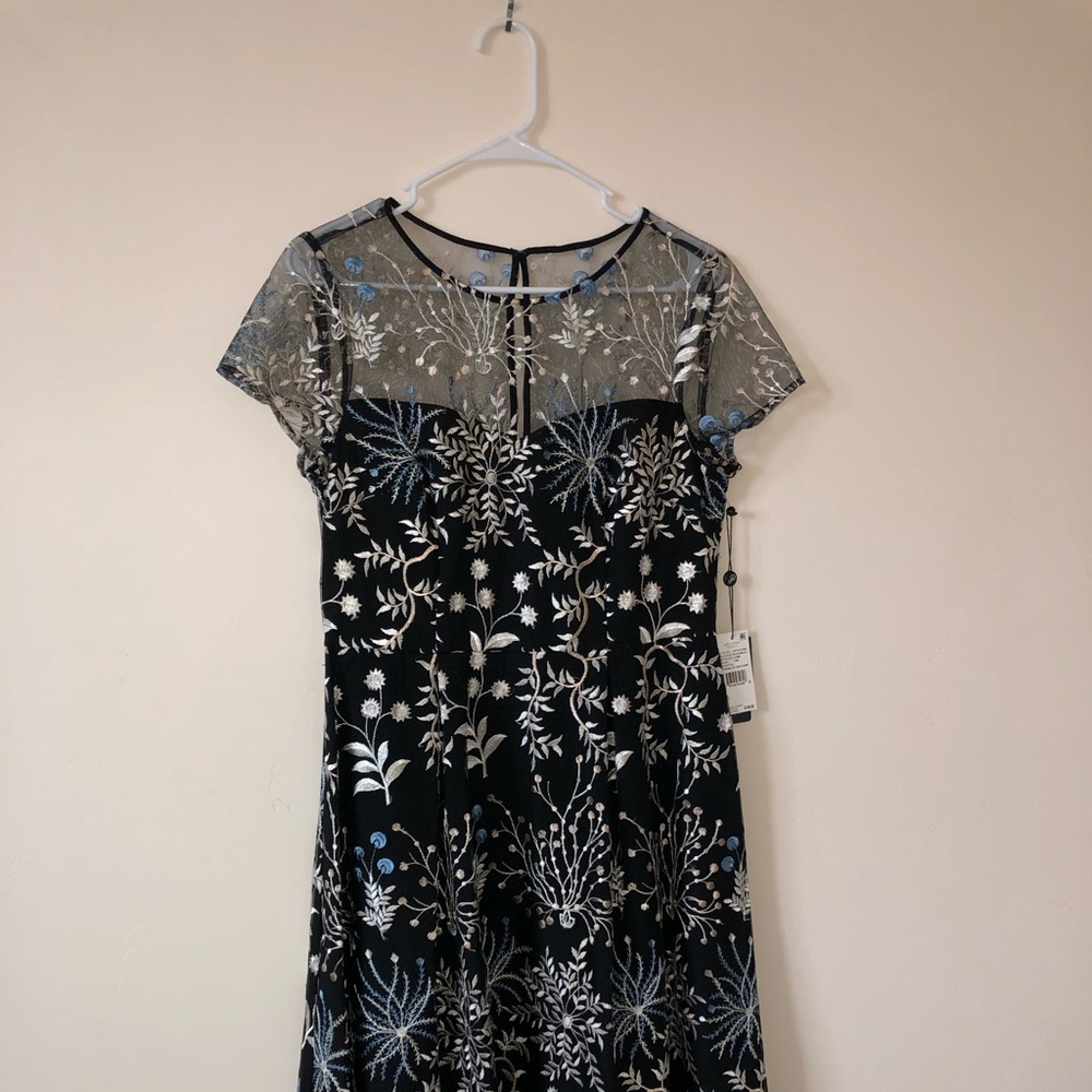 Black cap sleeve floral dress